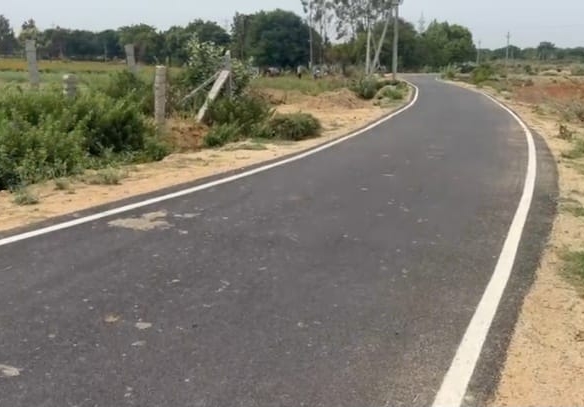 BT road Facing red soil land