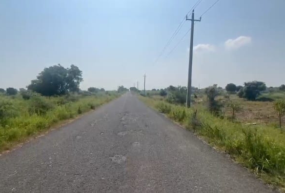 BT Road Facing Agriculture Land